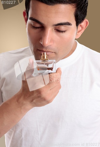 Image of Male smells fragrance some perfume cologne