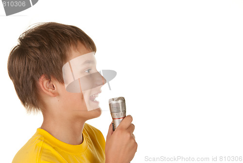 Image of boy with microphone on white
