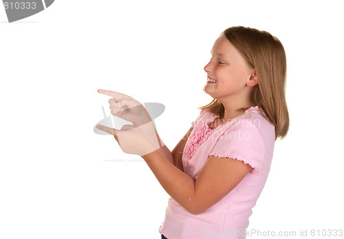 Image of young girl pointing on white