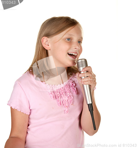 Image of young girl singing karaoke on white