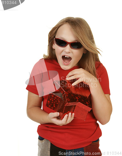 Image of girl opening gift on white