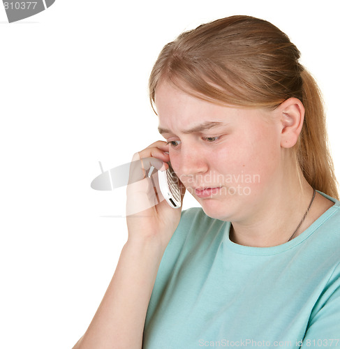 Image of upset teenager gets bad phone call