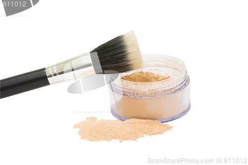 Image of opened jar with make-up powder and brush isolated