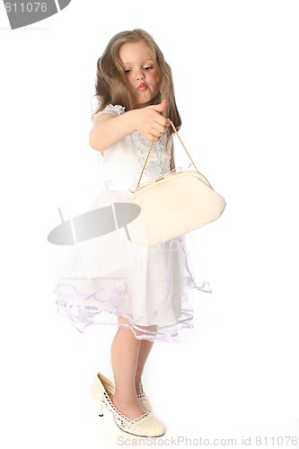 Image of little girl evaluating theater bag