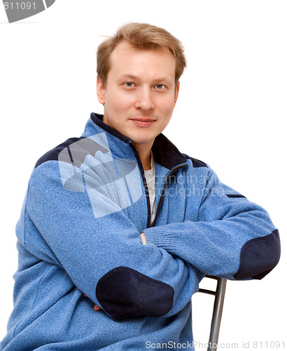 Image of Portrait men blond sits on chair