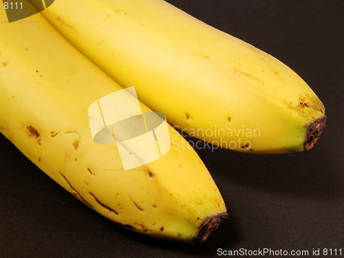 Image of Bananas over black background-Natural,imperfect look.