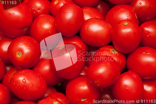 Image of Red tomatoes by background