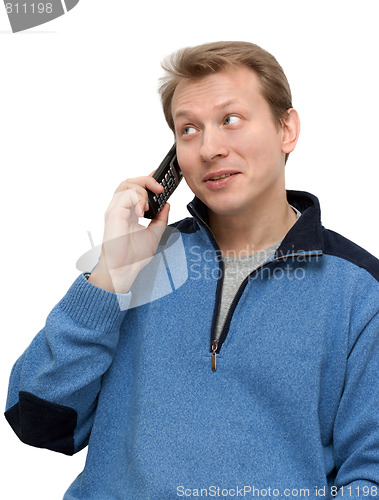 Image of Man speaks on telephone