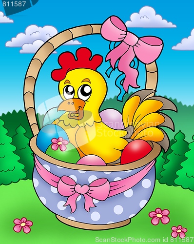Image of Easter basket with happy chicken