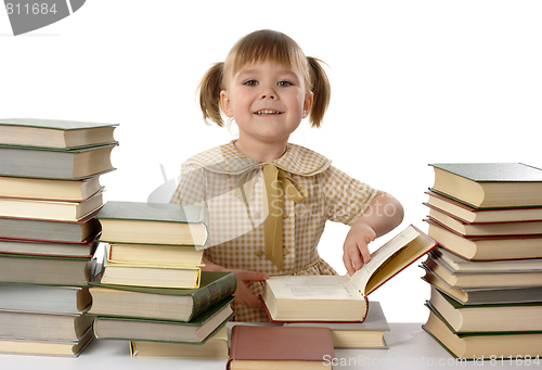 Image of Little girl with books, back to school