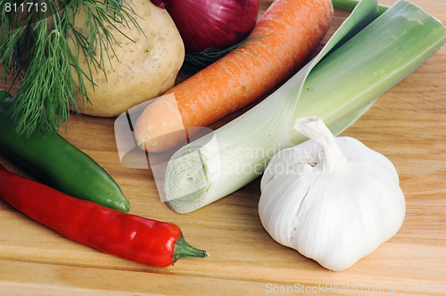Image of  vegetables  on a wooden kitchen board