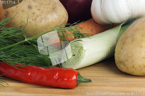Image of  vegetables  on a wooden kitchen board