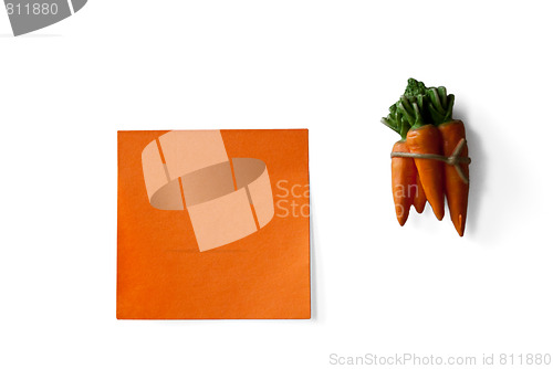 Image of orange sticky note and carrots bunch isolated on white