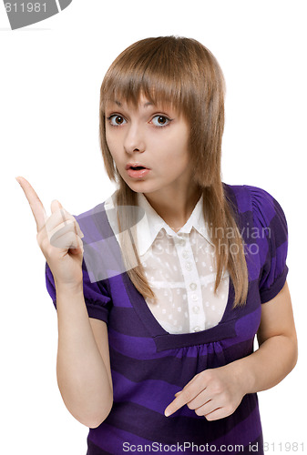 Image of Young beautiful girl shows finger