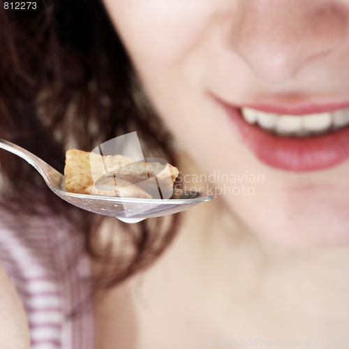 Image of Young people eating milk with cereals