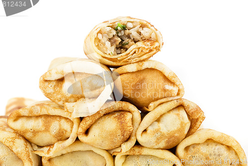 Image of pancakes with meat and rice