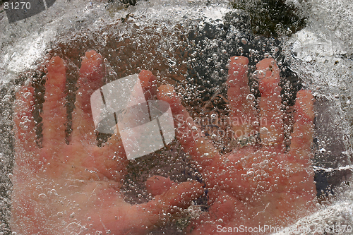 Image of human beeing under ice