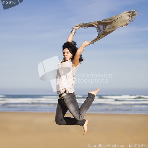 Image of pretty happy girl jumping