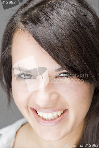 Image of beautiful young girl smiling