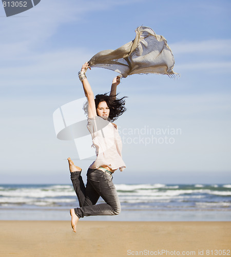 Image of pretty happy girl jumping