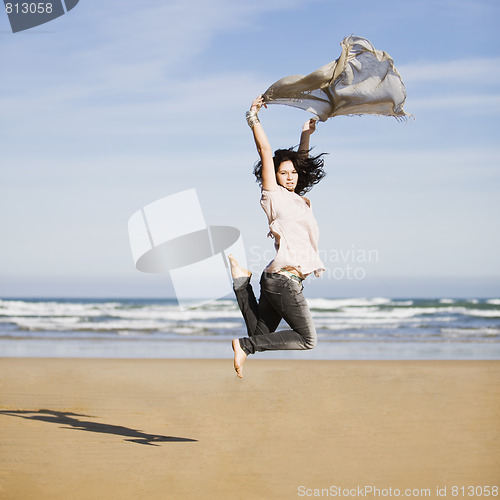 Image of pretty happy girl jumping