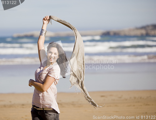 Image of young pretty girl beach