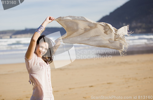Image of young pretty girl beach