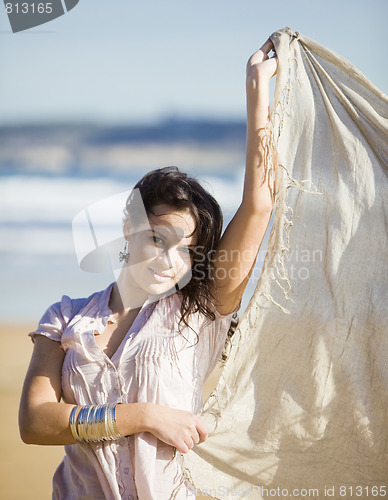 Image of young pretty girl beach