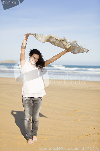 Image of young pretty girl beach