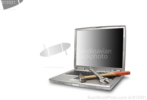 Image of laptop and tools