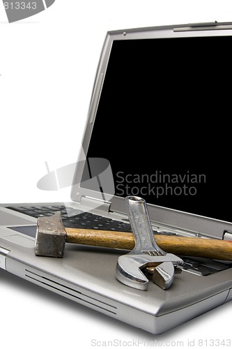 Image of laptop and tools