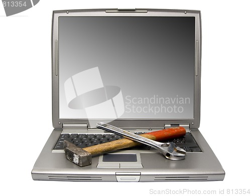 Image of laptop and tools