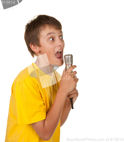 Image of boy with microphone on white