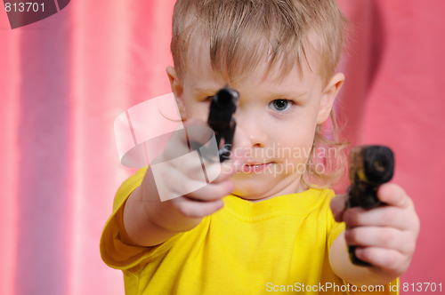 Image of boy with pistol
