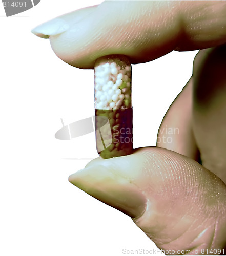 Image of Hand and pill