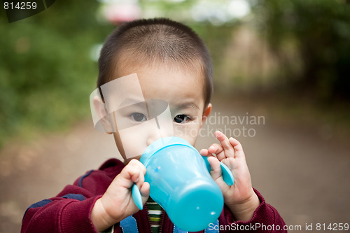 Image of Drinking asian boy