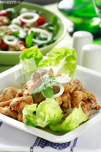 Image of Chicken stripes with salad