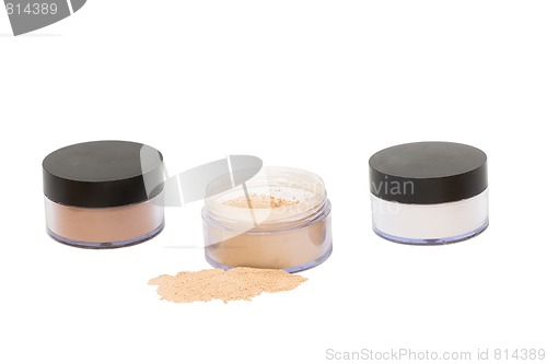 Image of Three  jars with beaty powder isolated
