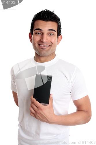 Image of Smiling man holding retail product