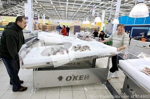 Image of Worker in supermarket