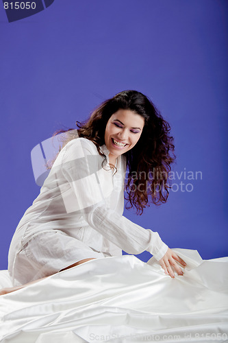 Image of Beautiful woman on the bed