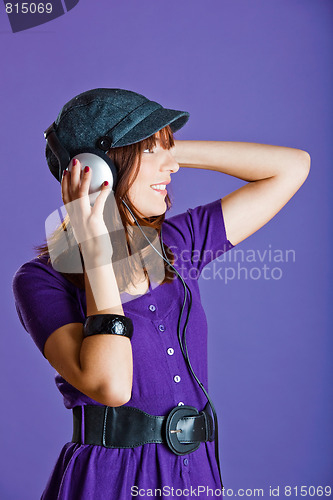 Image of Beautiful woman listening music