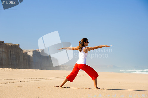 Image of Young woman making Yoga