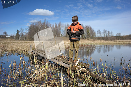 Image of boy on the bridge