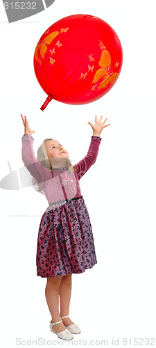 Image of Girl playing with balloon.