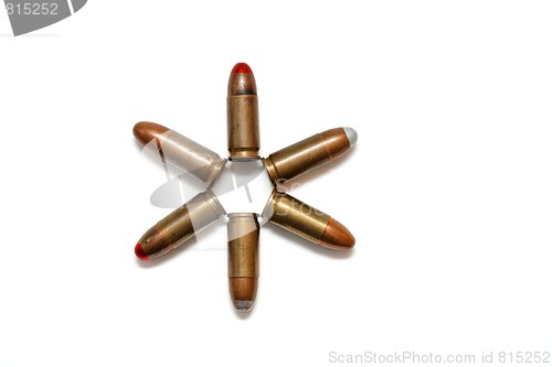 Image of Six-pointed star made of 9mm Parabellum cartridges isolated