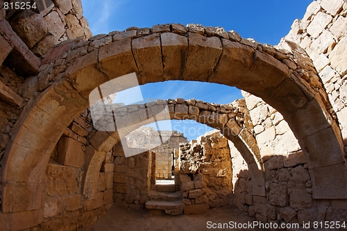 Image of Converging ancient stone arches 