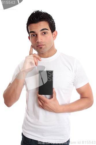 Image of Man considering a product