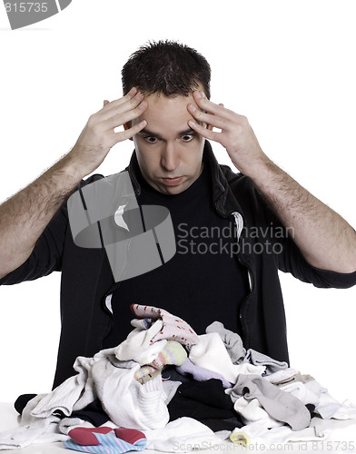 Image of Man Sorting Laundry