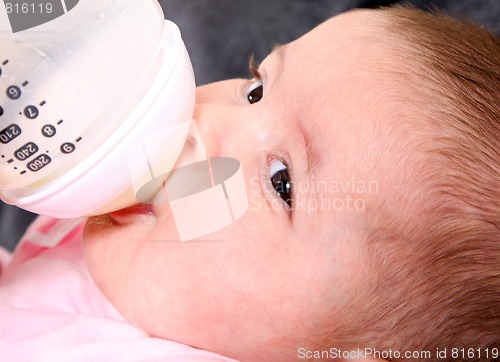 Image of Baby bottle feeding